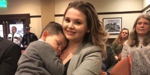 _st_Photo of Rebecca and son at hearing; Feb 12 2018
